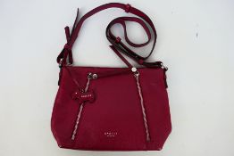 Radley - A Radley London purple leather shoulder bag - Shoulder bag has one interior zip pocket and