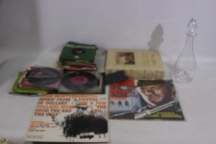 A collection of 7" records, two 12" records,