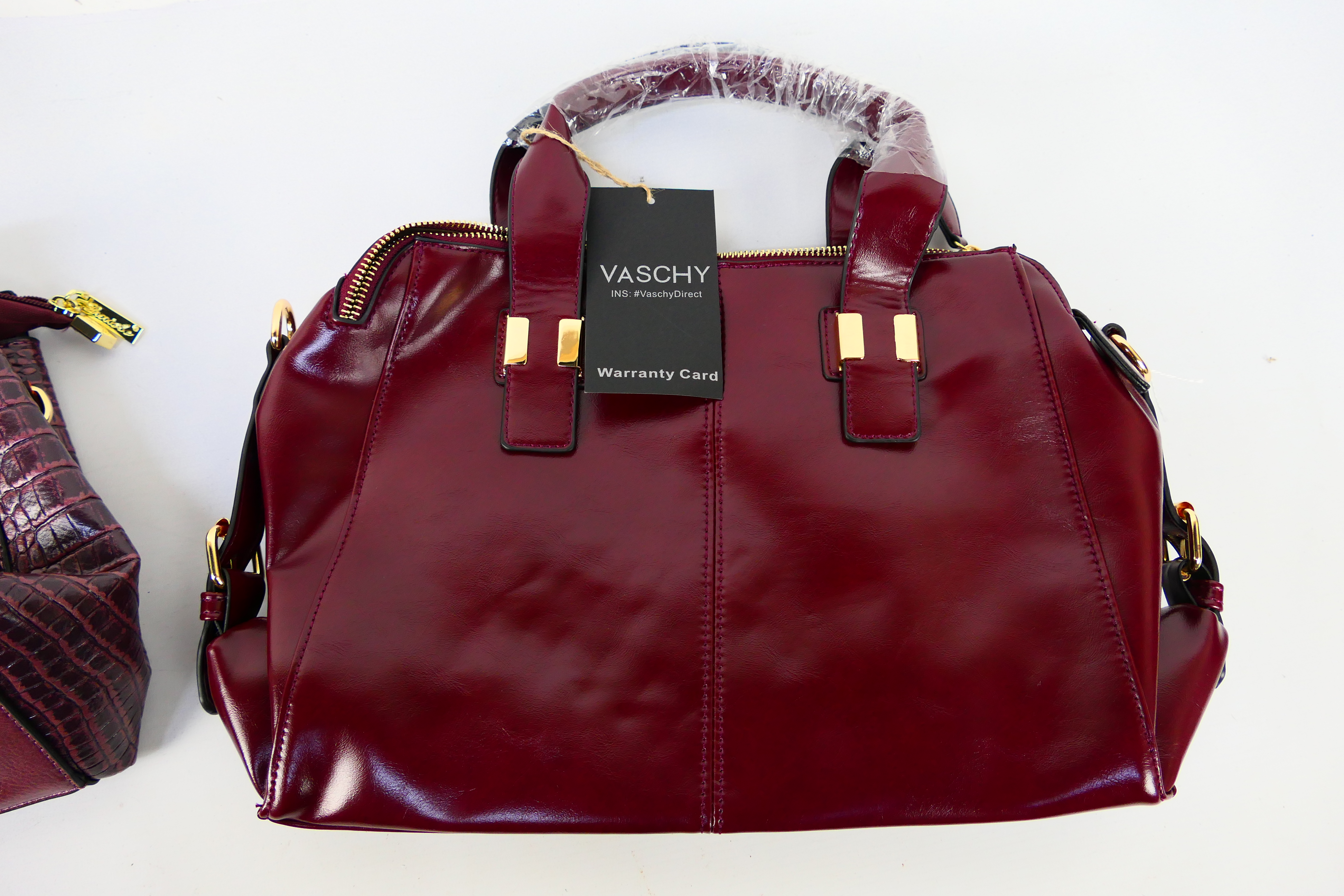 Vaschy - Lirenniao - a maroon Vaschy handbag with tags and shoulder strap, - Image 4 of 5