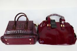 Vaschy - Lirenniao - a maroon Vaschy handbag with tags and shoulder strap,