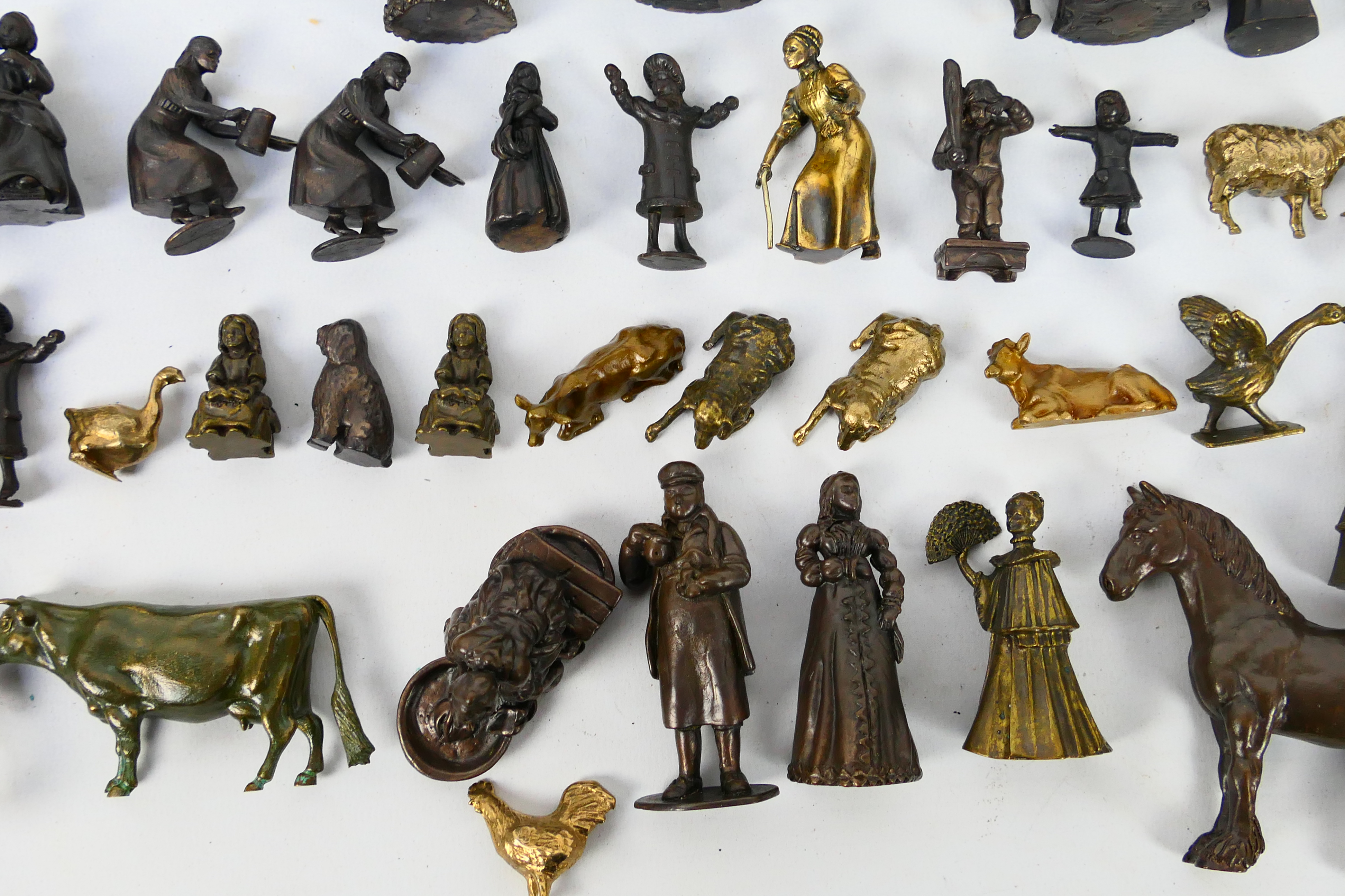 A large collection of bronze figures to include Victorian style, servants, children, - Image 5 of 7