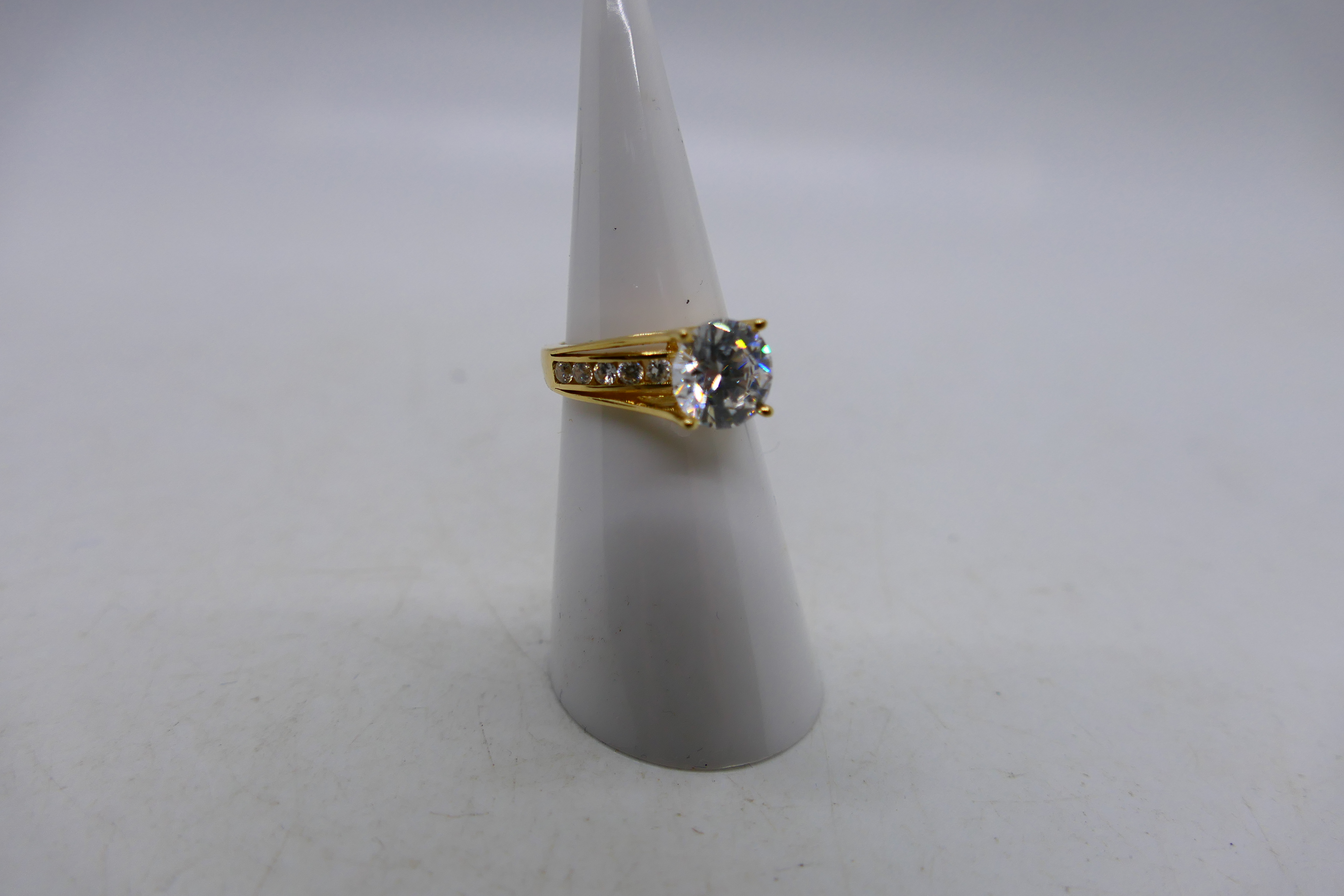 A 14ct yellow gold CZ set ring, size H+½, 3.5 grams all in. - Image 2 of 6