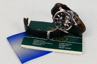 A Seiko Premier Kinetic Perpetual gentleman's wrist watch, 7D48-0AA0, on black leather strap,