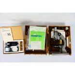 Olympus - Student Microscope. A boxed HSC #650992 Olympus Student Microscope.