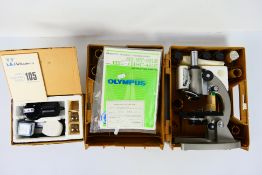 Olympus - Student Microscope. A boxed HSC #650992 Olympus Student Microscope.