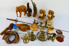 A mixed lot to include treen, brassware, horn carvings and other.