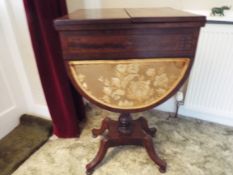 An early Victorian mahogany drop leaf work table,