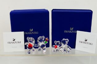 Swarovski - Two boxed crystal groups comprising Kris Bear Happy Together, approximately 4.