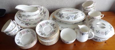 Royal Worcester - A collection of dinner and tea wares in the June Garland pattern,