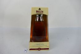 A 70cl bottle of Bells Millennium 2000 8 year old whisky, 40% abv, contained in presentation box.