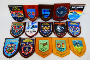 A collection of commemorative wooden shield plaques 1980's to 2000's relating to International Air