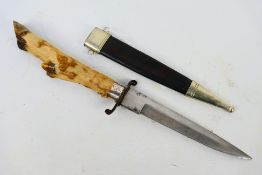 A late 19th century deer foot hilt Swedish dagger, 17 cm (l) blade, the hilt with silver mount, c.