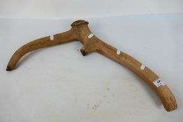 A pick or axe formed from deer antler, believed by the vendor to be a stone age example,