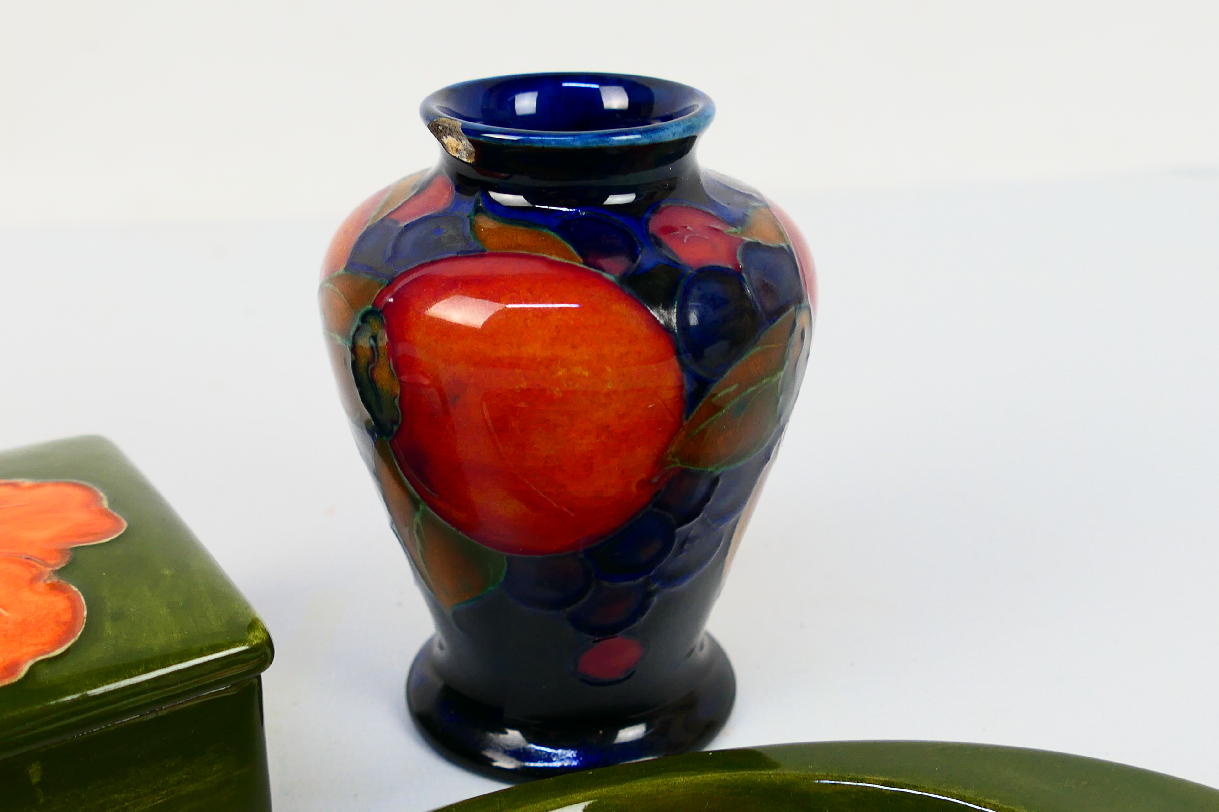 Moorcroft Pottery - Three pieces comprising a small vase decorated in the Pomegranate pattern (chip - Image 4 of 7