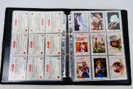 Coca Cola - Four series of Coca Cola trading cards produced between 1993 and 1995,