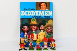 Ken Dodd's Diddymen Annual 1973 and five plastic Diddymen figures.