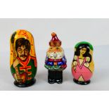 Russian Nesting Dolls - Two sets of Matryoshka dolls the first decorated with The Beatles, John,