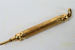 A yellow metal Samson Mordan & Co propelling pencil, stamped S. Mordan & Co, approximately 15.