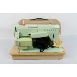 A vintage Singer 258 electric sewing machine.