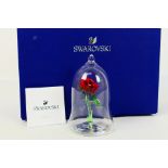 Swarovski - A boxed Disney Beauty and the Beast Enchanted Rose and Dome, box with outer card sleeve.