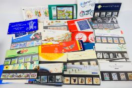 Philately - A quantity of IOM and Royal Mail mint stamp packs and a s small quantity of loose