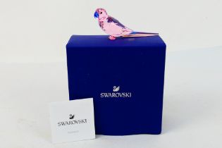 Swarovski - A boxed crystal figure from the Jungle Beats collection, Pink Parakeet Cha Cha,