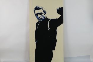 A print on canvas depicting Steve McQueen as Frank Bullitt in iconic pose,