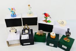 A collection of nine boxed enamel and similar trinket boxes, animal form and other.