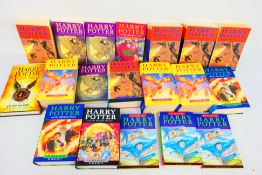 A collection of Harry Potter novels to include first editions.