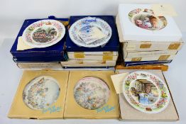A quantity of boxed collector plates to include Peter Pan,