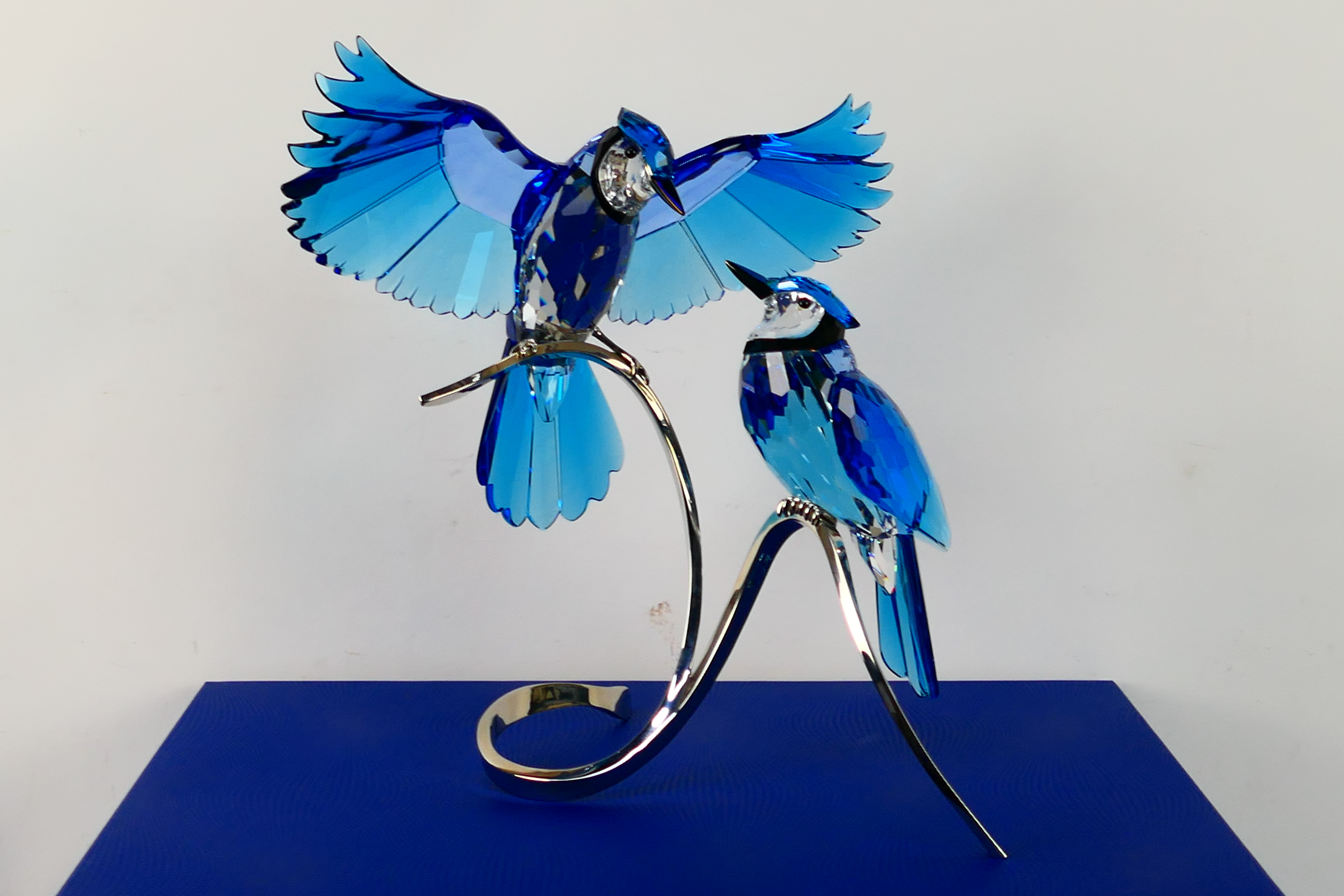 Swarovski - A boxed crystal group from the Paradise Crystal Birds collection depicting two Blue