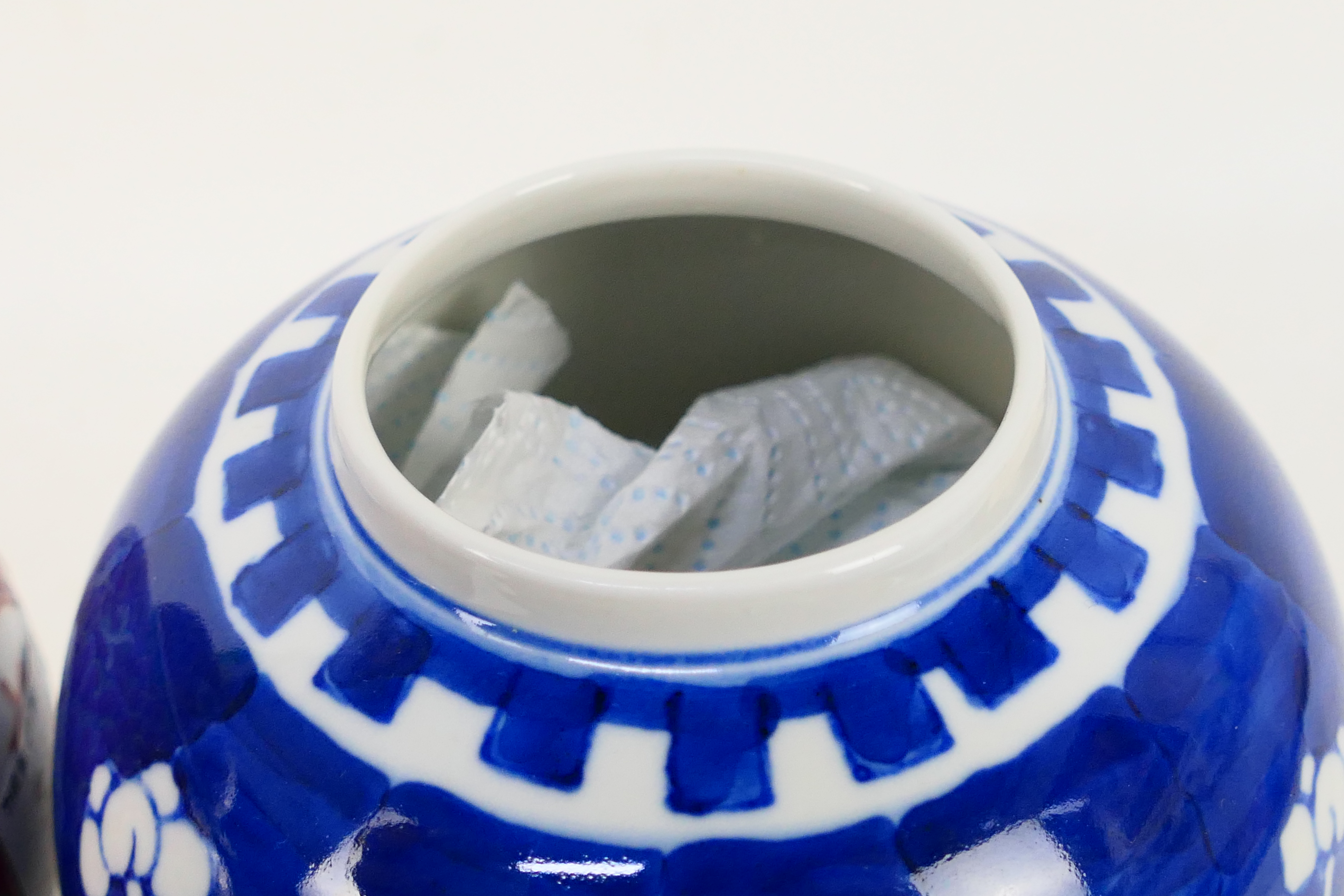 Two ginger jars and covers, one in blue and white decorated with prunus, approximately 15 cm (h). - Image 5 of 8