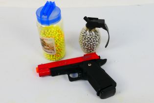 A single shot 6mm BB pistol with 2 containers of 6mm BBs