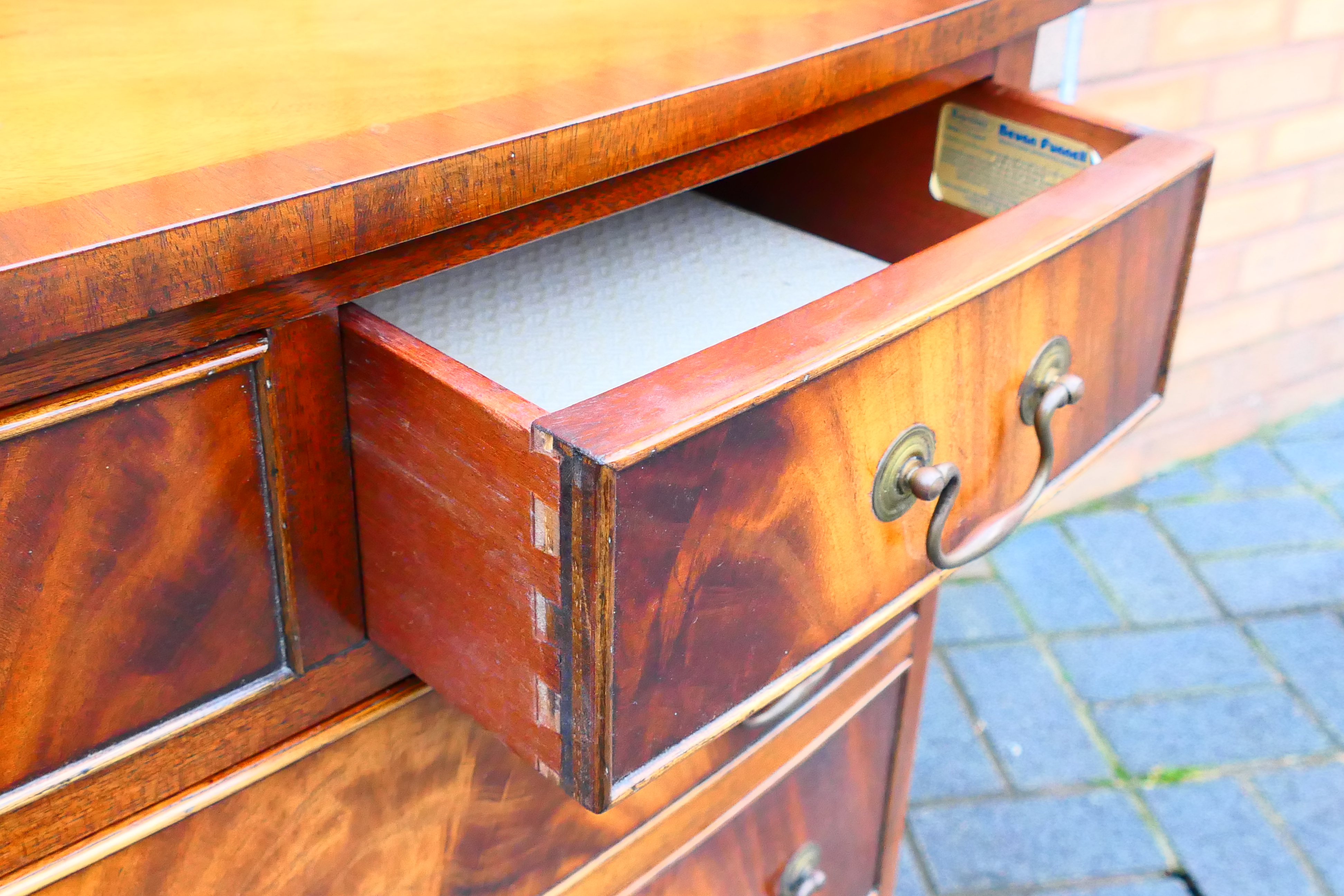 A bow front chest of two over three drawers, raised on outswept supports, - Image 4 of 5