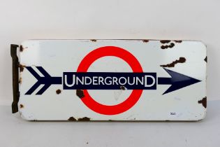 A vintage London Underground, double sided, enamel directional sign, approximately 28 cm x 66 cm.