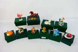 Ten boxed enamel trinket boxes Secrets From Hidden Treasures, animal form and similar.