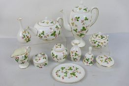 Wedgwood - A collection of Wild Strawberry pattern pieces to include teapot, coffee pot, sugar bowl,