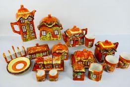 A collection of Price Kensington Cottage Ware pieces to include teapots, cruets,