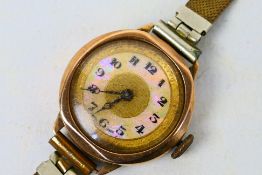 A 9ct gold cased wrist watch, 2.3 cm (d).