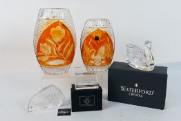 A collection of crystal wares to include two cut to clear vases, largest approximately 25 cm (h),