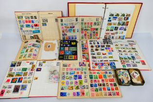 Philately - A collection of vintage stamp albums containing UK and world stamps and a small