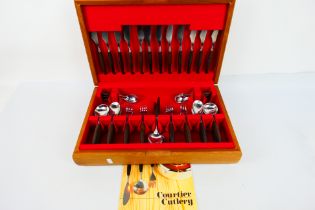 A canteen of 1960's Norwegian made Courtier Cutlery, stainless steel with wooden handles.