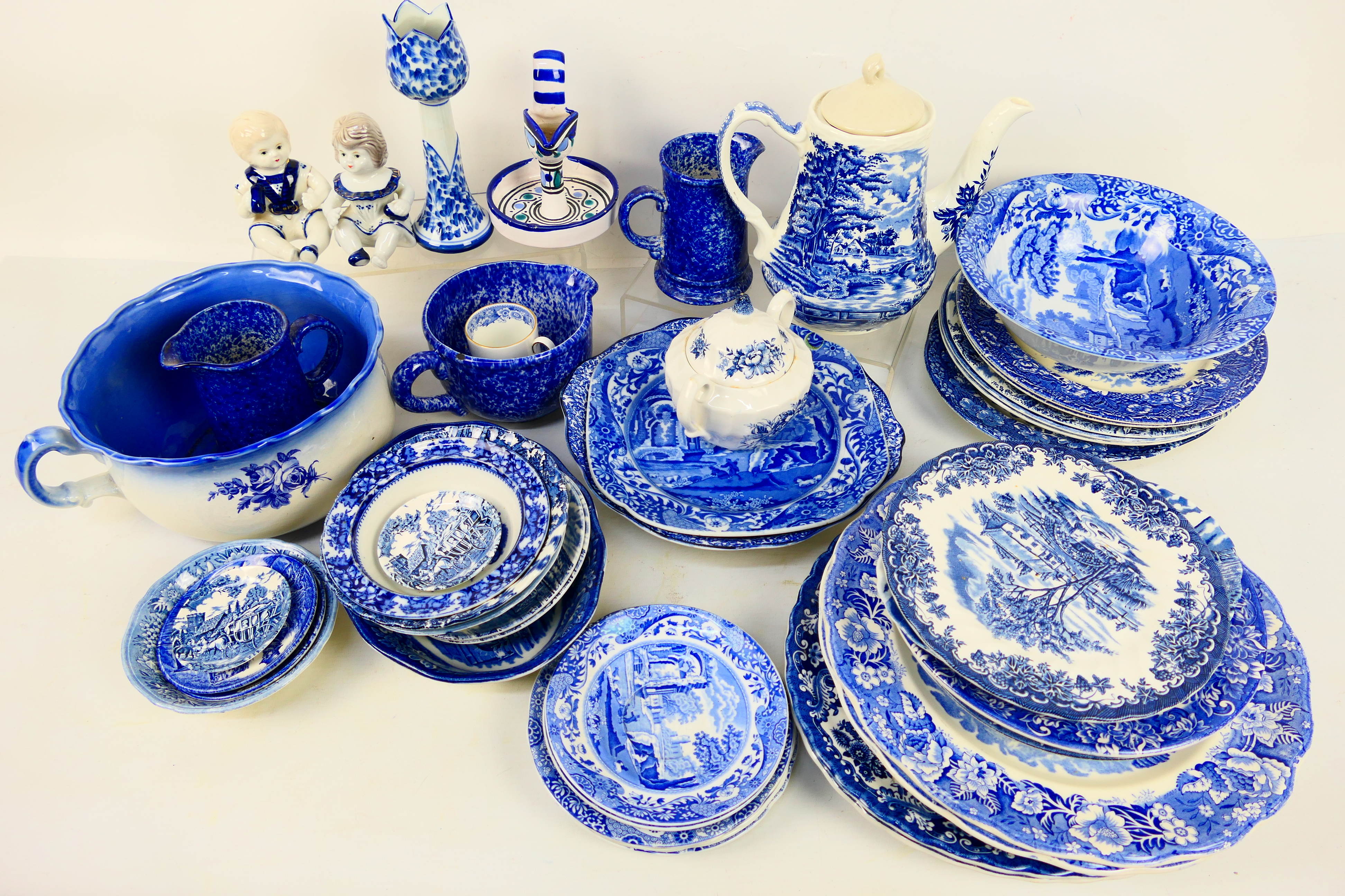A collection of blue and white table wares, in excess of thirty pieces.