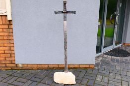 A large hand crafted model The Sword In The Stone, approximately 140 cm (h).