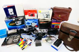 Photography - Cameras and accessories to include Olympus, Canon, Samsung and other.