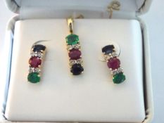 A pendant and earring set by RJM, with ruby, emerald and sapphire stones,