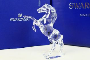 Swarovski - A boxed crystal figure depicting a rearing stallion, approximately 17 cm (h),