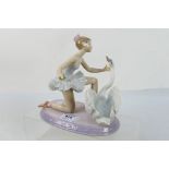 A Lladro figural group # 6205, Graceful Dance, depicting a ballerina and a swan,