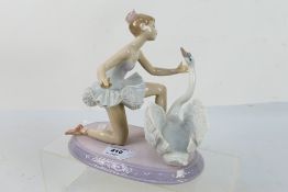 A Lladro figural group # 6205, Graceful Dance, depicting a ballerina and a swan,