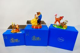 Disney - Three boxed enamel groups / trinket boxes comprising Beauty And The Beast and Bambi,